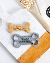 Load image into Gallery viewer, Happy Howlidays Cookie Cutter-  Bone Shaped Christmas Dog Cookie Cutter
