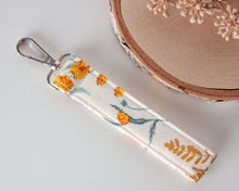 Load image into Gallery viewer, Boho Floral Keychain Wristlet
