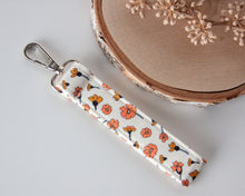 Load image into Gallery viewer, Boho Floral Keychain Wristlet
