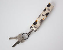 Load image into Gallery viewer, Rooted Solitude Keychain Wristlet
